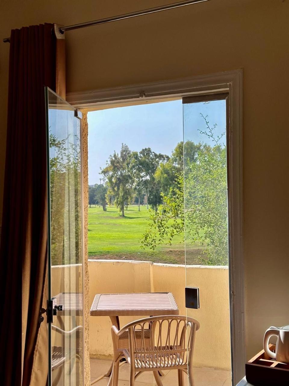 Hotel Golf Pyramids View à Kafret el-Gabal Extérieur photo